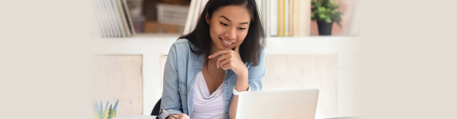 young lady using laptop